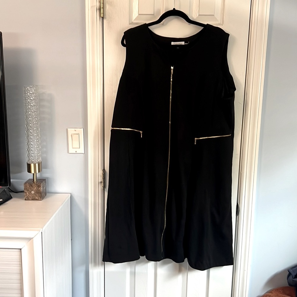 Cute black dress with gold hardware